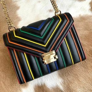 Help find Michael Kors rainbow Whitney